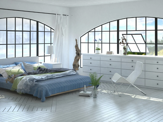 What is the ideal rug size for a queen bed?