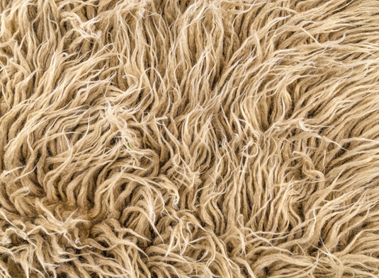 Are your rugs made of pure wool or blended material?