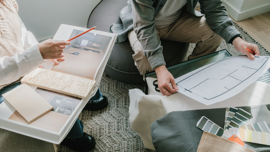Designing with Rugs to Create Flow and Continuity Between Spaces